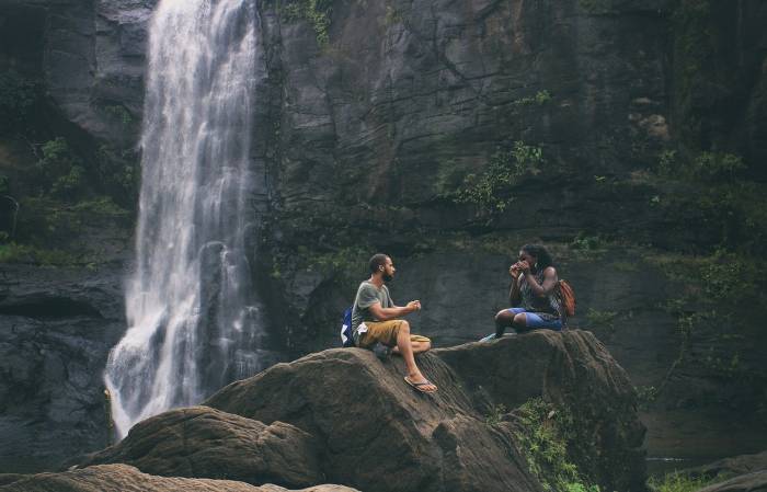 couple next to waterfall